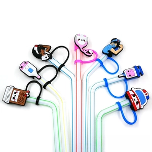 Detailed view of medical themed silicone straw covers featuring nurse and ambulance designs