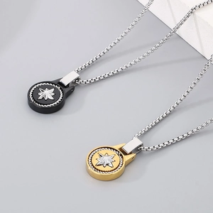 Men's stainless steel necklace with round eight-pointed star pendant in black and gold