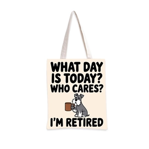 Détail du sac fourre-tout en toile avec motif Schnauzer et texte humoristique Retired