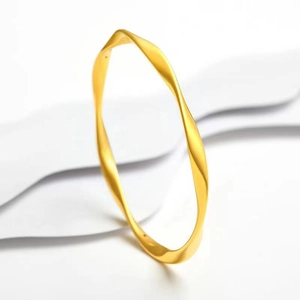 Bracciale rigido Mobius oro opaco da donna con un design intrecciato minimalista