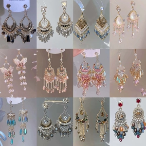 Set of 12 luxury bohemian crystal tassel earrings featuring gold filigree and water drop charms