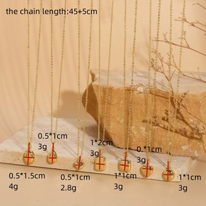 Selection of gold hexagon star necklaces with zircon pendants on stone props