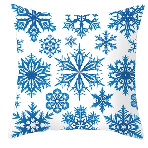 Detail showing blue snowflake patterns on a white winter square pillowcase cover