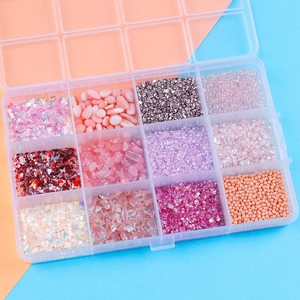 12-grid storage box with colorful sequins, crushed stones, and faux pearls for nail art DIY