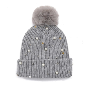 Winter gray knit beanie for women with fluffy pompom and elegant white pearl accents