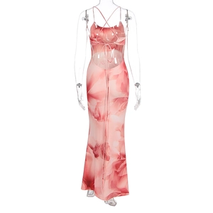 Detail of cross-tie back design on a pink floral print backless maxi dress for women