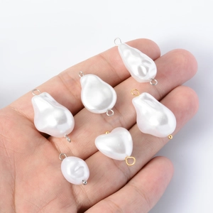 Baroque style faux pearl pendants with gold and silver loops for DIY jewelry making