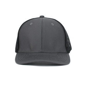 Close-up of Richardson 112 trucker hat showing breathable mesh and curved brim stitching