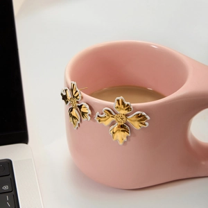 18K gold plated stainless steel flower earrings with white enamel on pink coffee cup