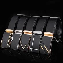 Detail of five black leather belts with various polished gold and silver automatic buckles
