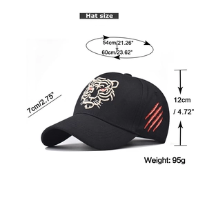 Detailed size chart for black baseball cap with embroidered tiger head and claw marks