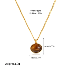 Detail view of 18K gold chain with tiger eye pendant and necklace specifications