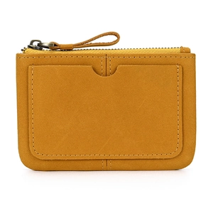 Close-up of tan nubuck leather coin purse with zipper closure and exterior card slot detail