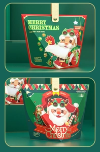 Detail of Christmas gift boxes with faux leather handles and festive holiday patterns