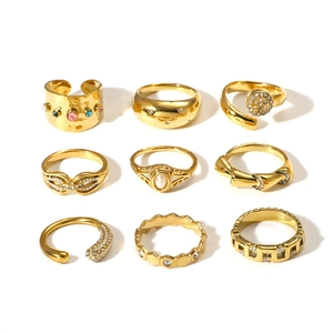 Nine-piece vintage gold ring set for women with faux pearls and rhinestones