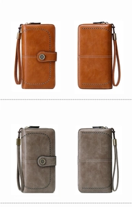 Detail view of perforated pattern and metal buckle on long leather RFID wallets