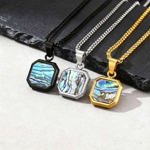 Detail view of square abalone shell necklaces in black, silver and gold finishes