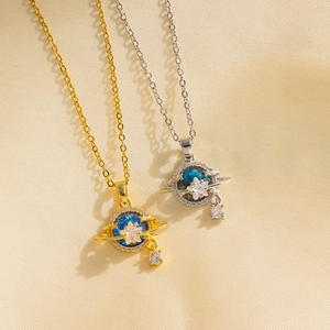 Dreamy planet planet pendant necklaces with zircons in gold and silver finishes