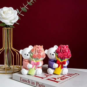 Detail of miniature resin bears holding rose bouquets for Valentine DIY decor