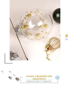 Close-up of 6cm decorative Christmas balls with golden beads and textured surface