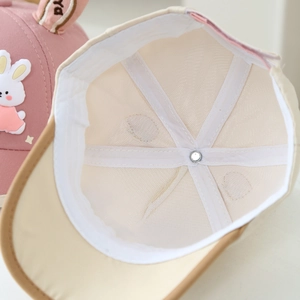 Breathable mesh lining and high-quality stitching detail on pink toddler bunny baseball hat
