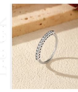Detail of vintage S925 silver eternity ring with sparkling small round row zircons
