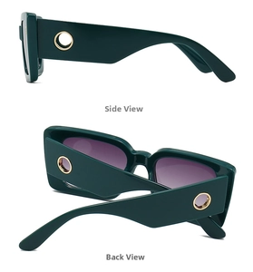 Detail view of dark green wide-frame sunglasses with gold hollow metal ring on temple