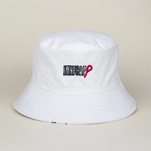 Detail of white canvas bucket hat featuring high-quality embroidered letters and red icon