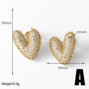 Detail view of 16mm heart stud earrings with 18k gold plating and cubic zirconia