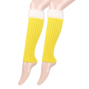 Detailed close-up of yellow knit leg warmers with white faux fur trim and cozy texture