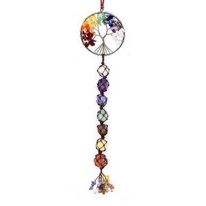 Detail of life tree chakra hanging decor with multicolor natural stones and woven net