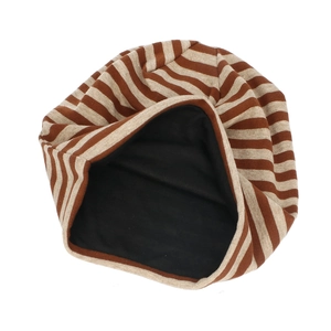 Close-up of double-layer knitted beanie with brown stripes and soft black inner lining