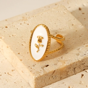 French vintage gold rose ring with white enamel and textured band on stone