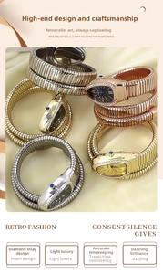 Macro shot of three snake-shaped quartz watches with diamond bezels in gold and silver