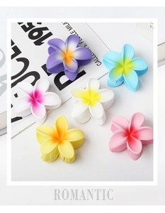 Detailed overhead view of six colorful 8cm matte frangipani flower hair claw clips for women