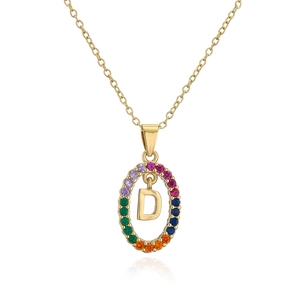 Close-up of gold-plated letter D pendant with colorful rainbow zircon stones in detail