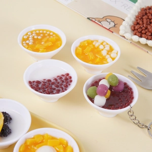 Miniature 5cm resin dessert bowl keychain featuring mango pudding and taro ball models