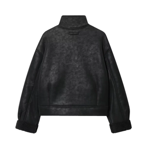 Women's black faux suede jacket featuring a stand collar and plush fur-trimmed cuffs back view