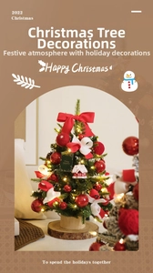 Mini Christmas tree detail with red bows, LED lights, and wooden base for desktop
