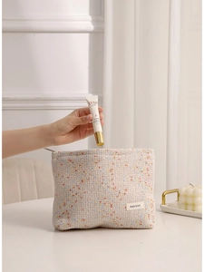 Chic tweed makeup bag with colorful specks and large capacity for cosmetics and skincare