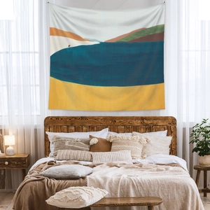 Detailed macro view of Bohemian tapestry with abstract mountains and lake wall decor