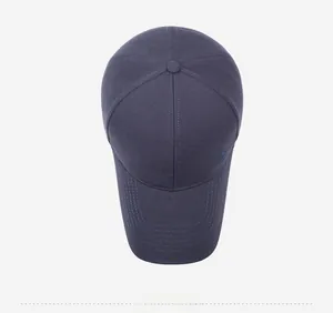Top down view of a navy blue baseball cap showing six-panel crown and embroidery details