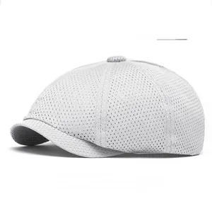 Close-up of light gray breathable mesh fabric on a stylish summer flat cap