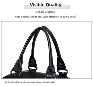 Detailed view of the dual leather handles with vintage bronze metal ring attachments