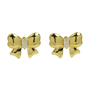Elegant gold bow earrings with a central rectangular clear zircon on white background