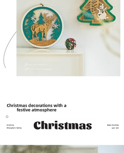 Detail of wooden Christmas ornaments with laser-cut reindeer and snowman forest scenes