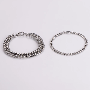 Silver stainless steel curb chain bracelet set showing 11mm and 5mm width contrast