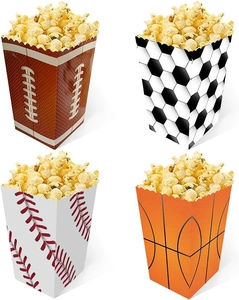 Detail view of four sports-themed popcorn boxes featuring football and soccer patterns
