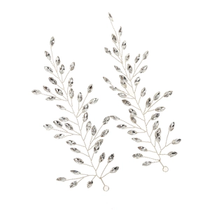 Pair of sparkling crystal leaf hair clips handcrafted with silver wire on white backdrop