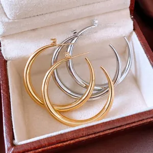 Polished 18k gold and silver plated geometric hoop earrings with zircon accents